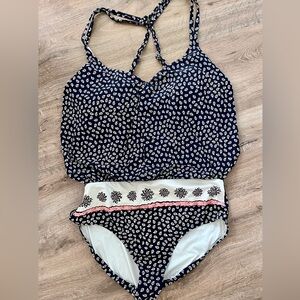 Ladies Anne Cole one-piece bathing suit.Navy paisley with a cute pink border.